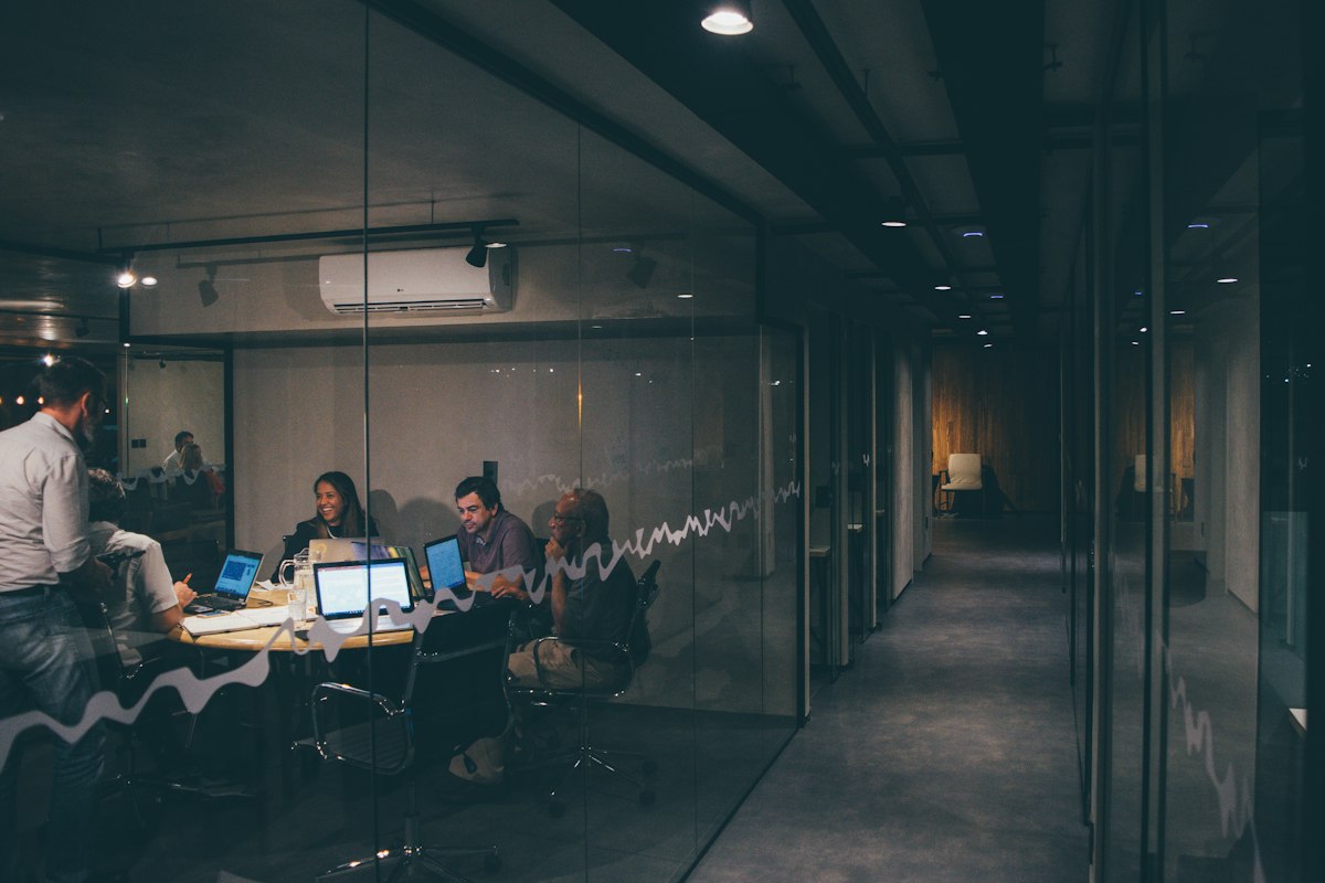 Team collaborating around a table in a meeting